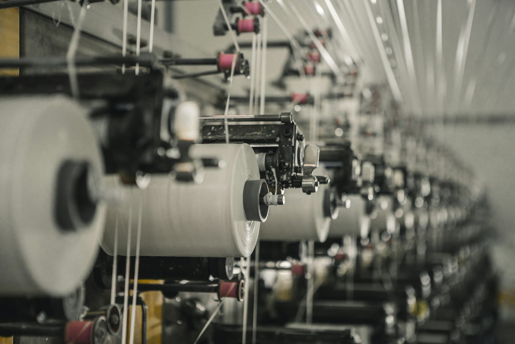 Yarn packages on a winding frame in a spinning mill