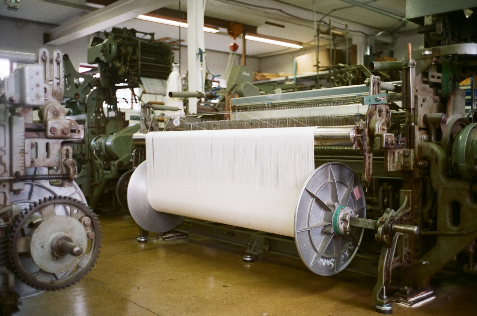A warp beam loaded on a weaving loom